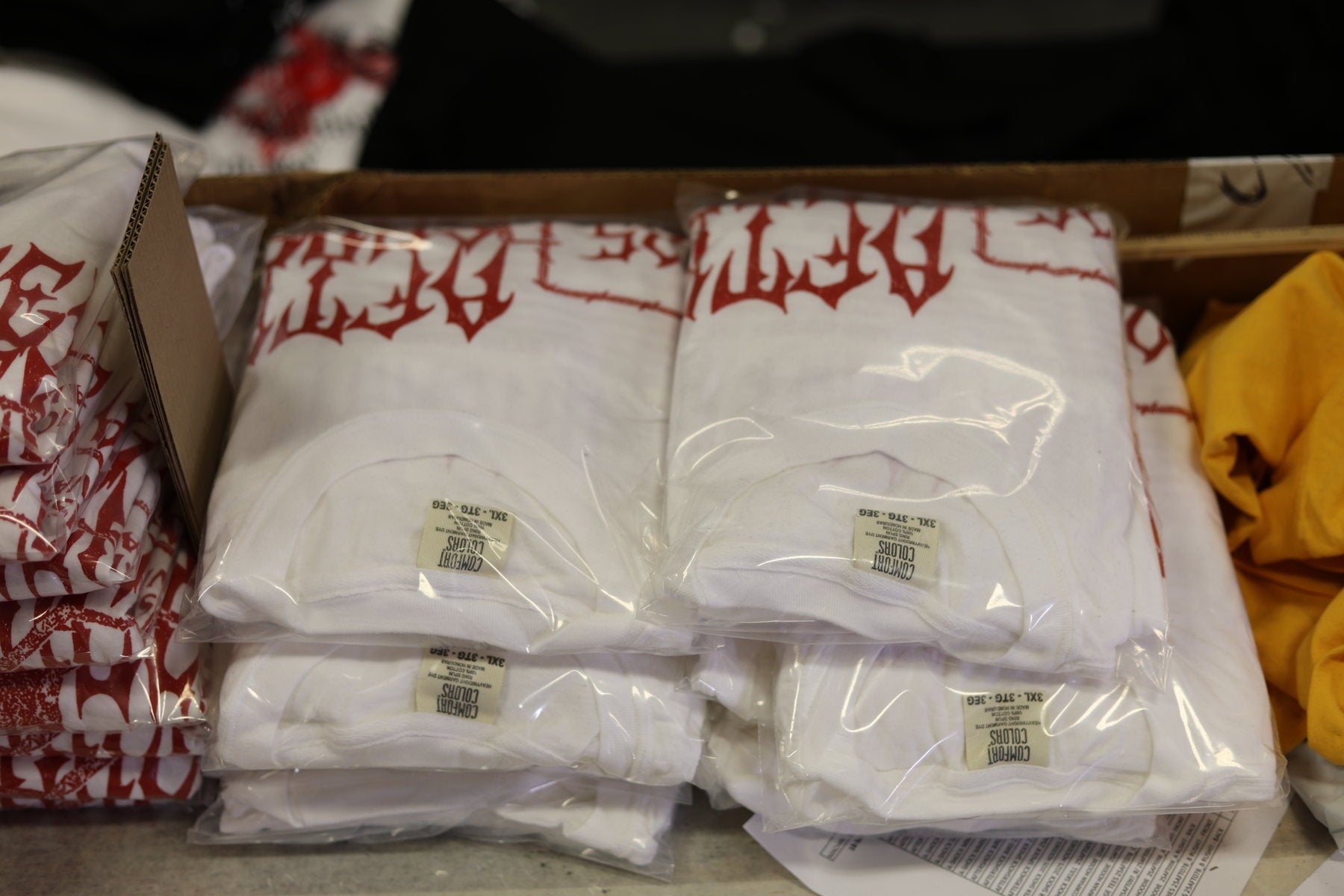 Folded and poly bagged printed shirts prepared for fulfillment