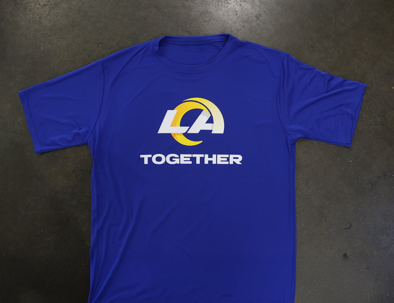 Blue team event shirt with clean front logo print