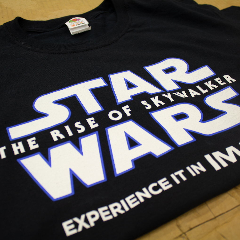 Black t-shirt with bold movie event graphic print